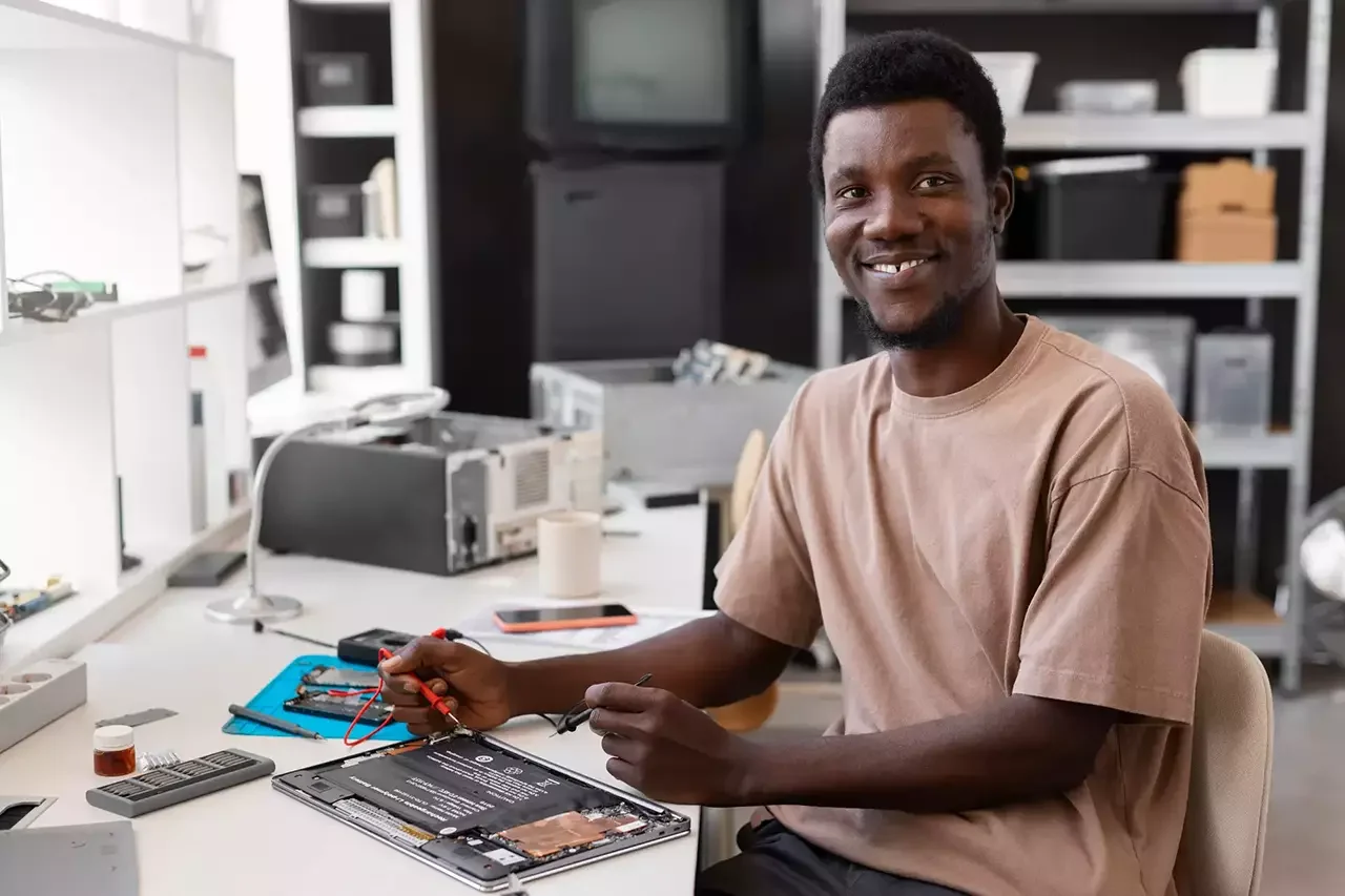 close up man repairing computer chips